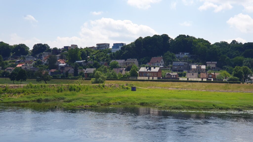 Scenic riverside walk along the Nemunas River in Kaunas, Lithuania