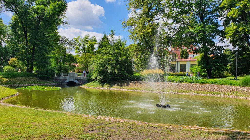 Riverside seating in Vilnius near park areas - ideal spot for relaxation in Lithuania’s green capital