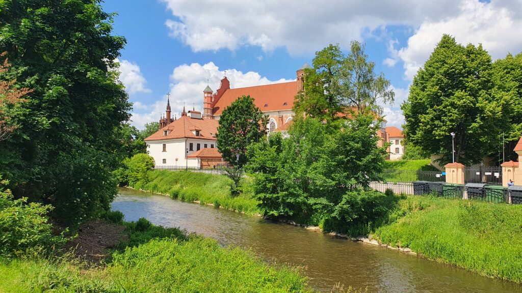 Riverside seating in Vilnius near park areas - ideal spot for relaxation in Lithuania’s green capital