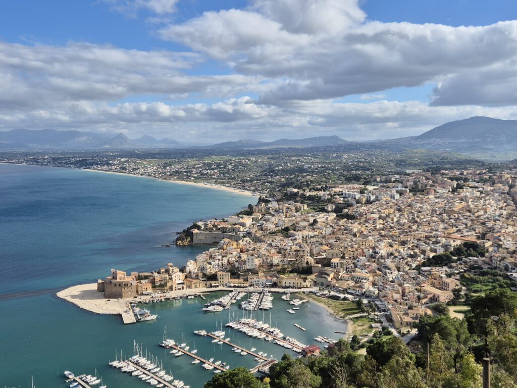 Monte Monaco Viewpoint: A breathtaking vista from the Monte Monaco viewpoint, featuring sweeping views of turquoise waters, rugged cliffs, and the pristine coastline stretching toward San Vito Lo Capo.