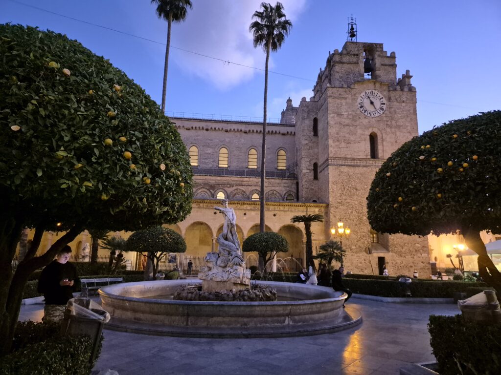 Monreale Cathedral Facade: The stunning facade of the Monreale Cathedral, featuring intricate Norman-style architecture, golden mosaics, and an impressive entrance that captures Sicily’s rich cultural history.