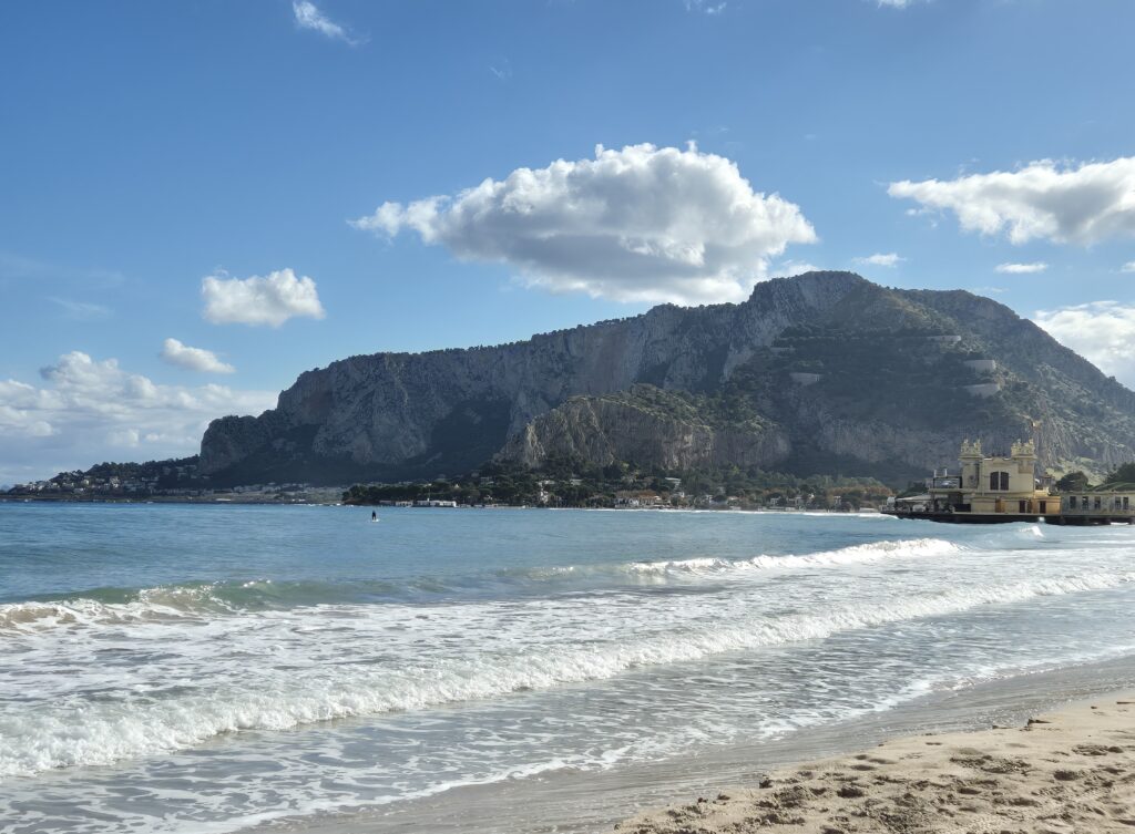 A captivating view of Ombelico del Mondo, Palermo’s symbolic "navel of the world," overlooking the scenic sea, with the shimmering Mediterranean waters stretching into the horizon.